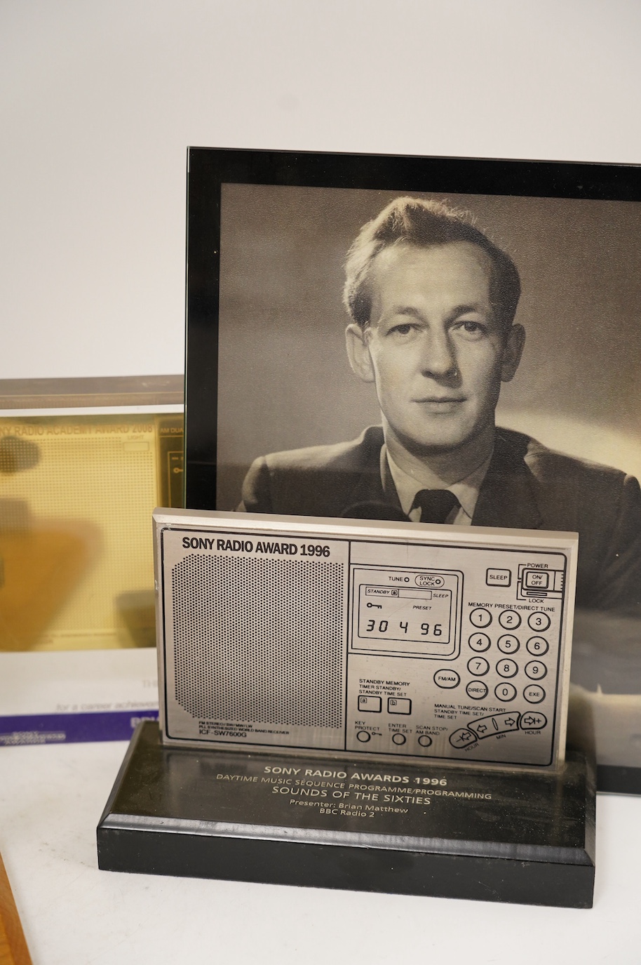 Five radio awards presented to Brian Matthew including; three Sony Radio Awards for 1988, 1996 and 2008, a glass pedestal bowl etched with the Radio Academy Hall of Fame Brian Matthew, and a Radio Academy recognition of